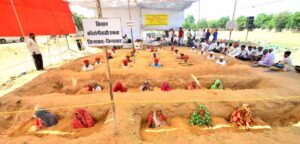 Farmer Graveyard Pits Neck-deep