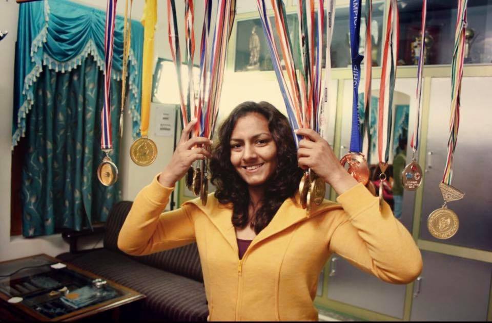 wrestler Geeta Phogat displays the medals that she has won for India in wrestling