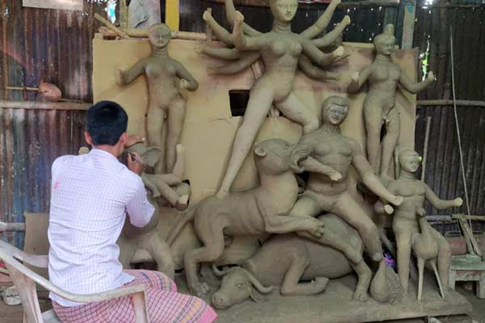 goddess durga puja idol pocso act bengal